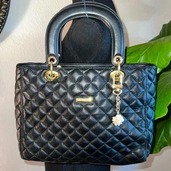St. John Handbags - St. John Women's Black Leather Quilted Handbag
Purse Gold Tone hardware W/ Charm